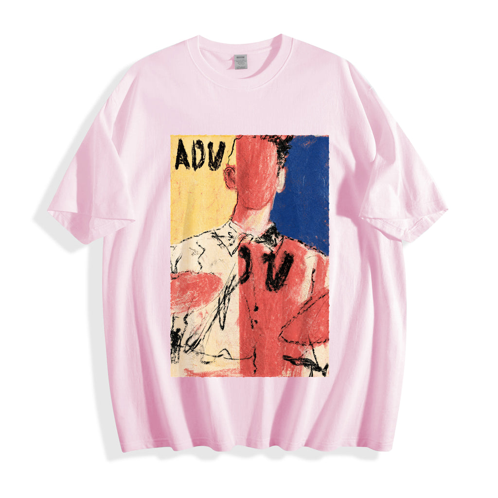 A flat lay of a light pink abstract faceless portrait graphic tee, blending soft pastel tones with a striking indie art aesthetic.