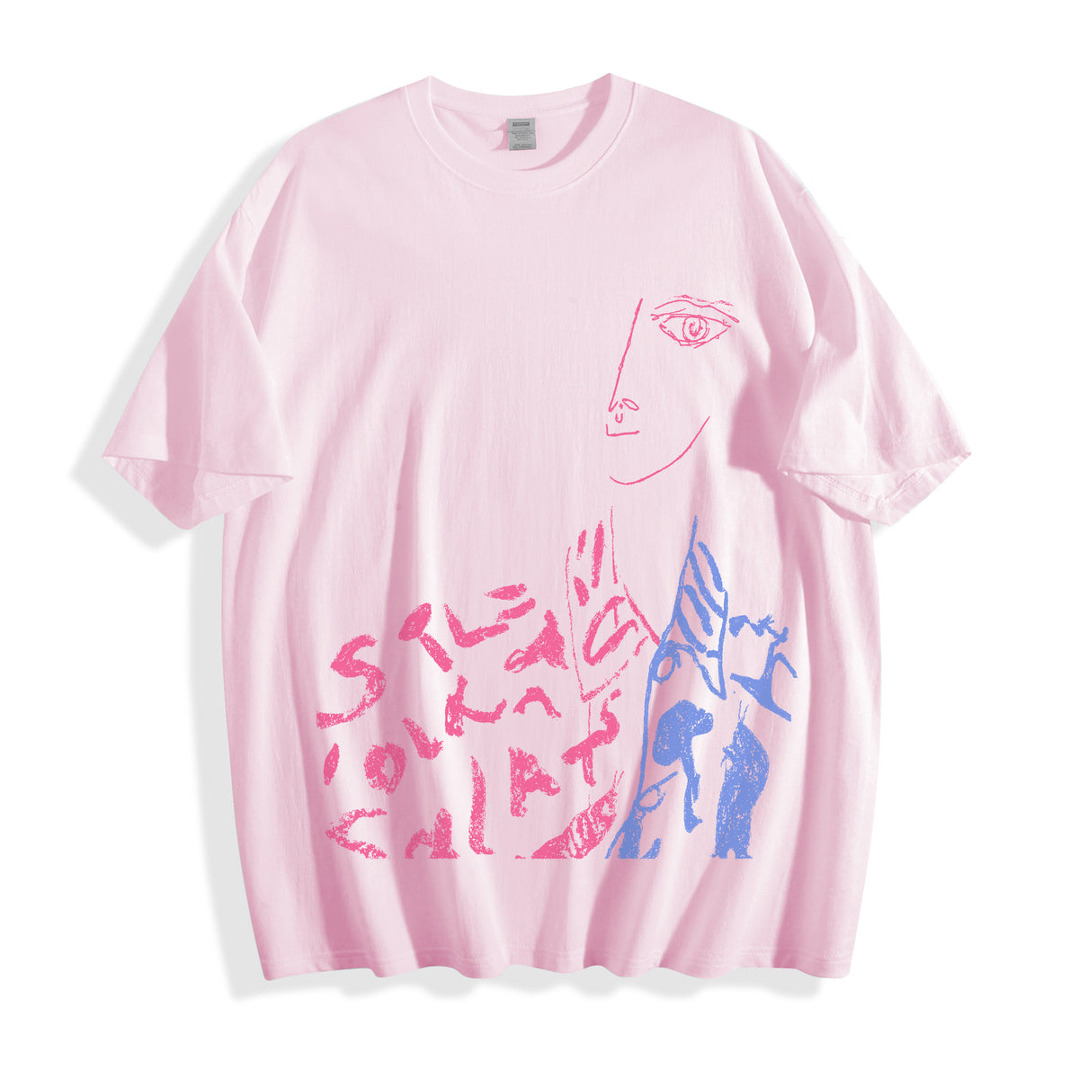 A light pink short-sleeve t-shirt with a graphic print of a stylized face and abstract shapes in pink and blue, displayed flat against a white background.