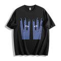 A black short-sleeve t-shirt with a bold surrealgraphic print of two blue hands with eyes on the front, displayed against a clean white background.