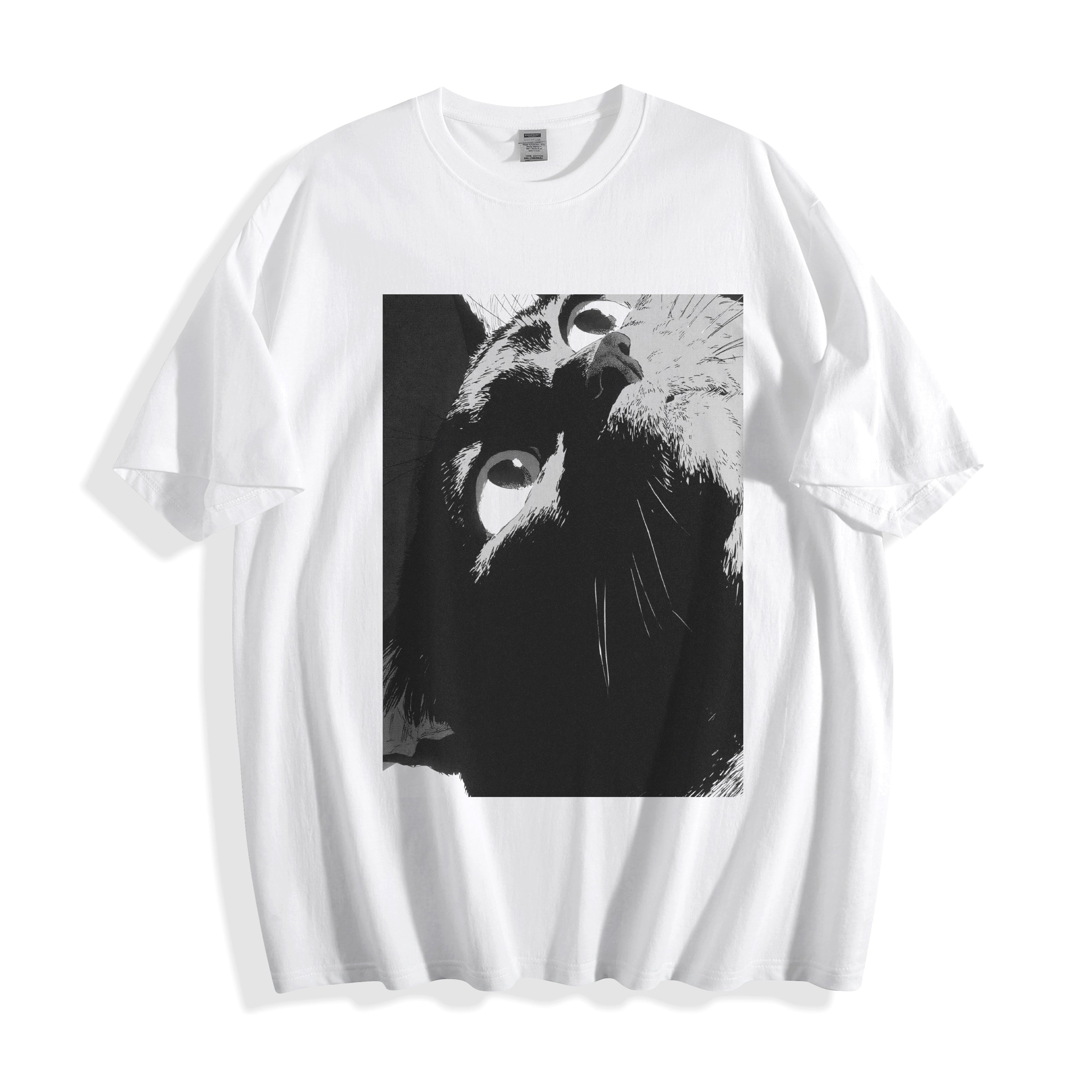 A flat lay of a white cat gaze manga panel graphic tee, displaying the crisp monochrome manga illustration on a clean background.