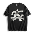 A flat lay of a black confident stride boy and dog graphic tee, featuring the sunny and energetic illustration for a positive streetwear look.
