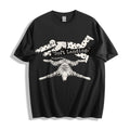 A flat lay of a black face down soft landing graphic tee, contrasting a dark base with the minimalist and deadpan face down design.