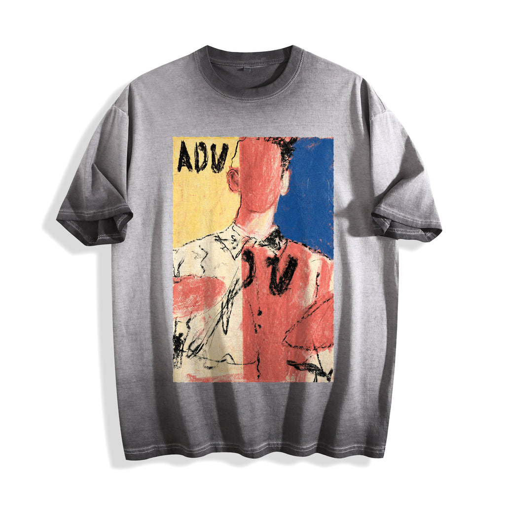 A flat lay of an ombre grey faceless portrait oil pastel graphic tee, featuring heavy oil-pastel strokes and vivid color blocks for an unpolished raw art look.