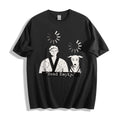 A flat lay of a black head empty buffering icon graphic tee, contrasting a dark base with the existential brain drain graphic.