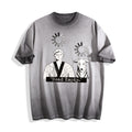 A flat lay of an ombre grey head empty buffering icon graphic tee, featuring a deadpan boy and dog system crash illustration.