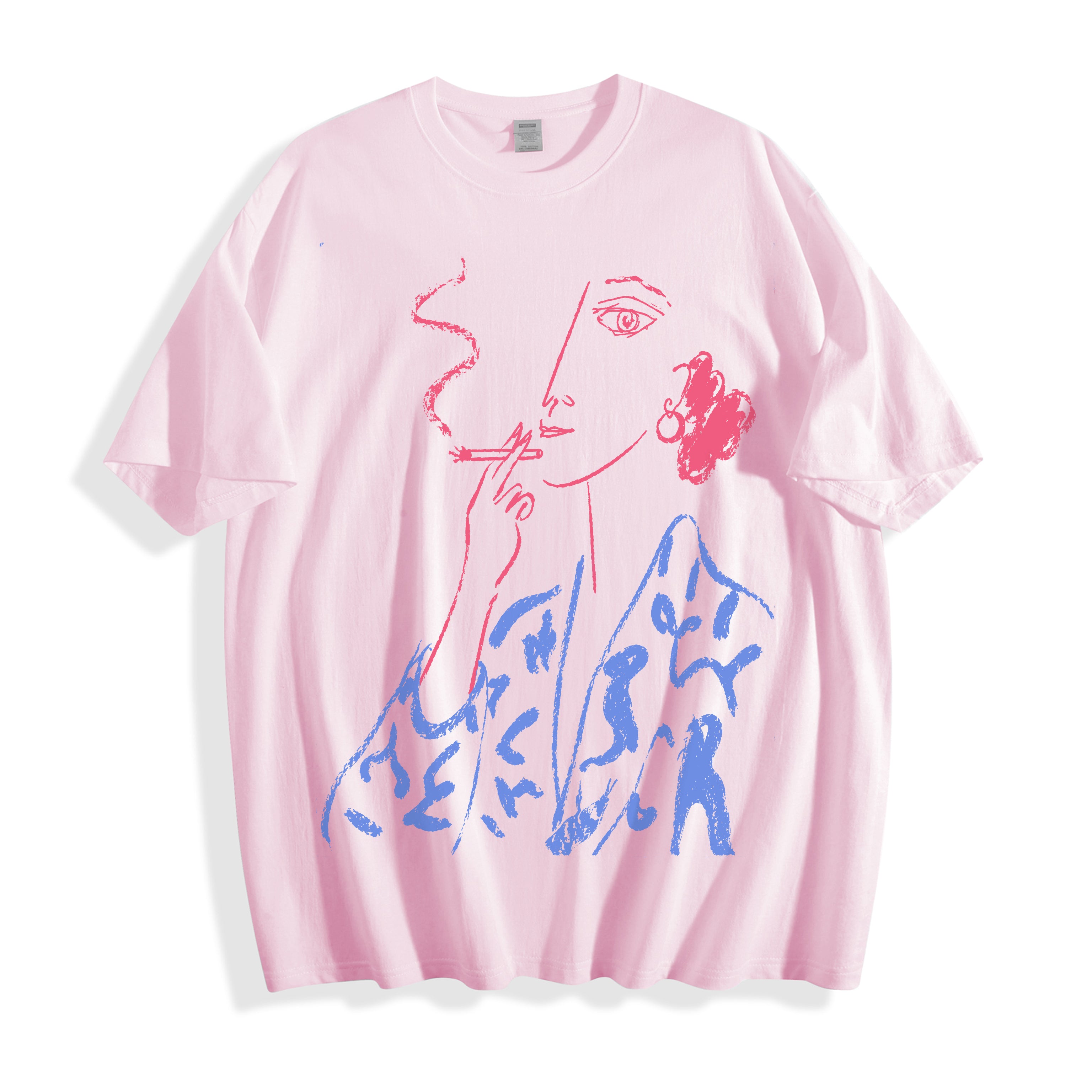 A light pink short-sleeve t-shirt with a graphic print of a stylized woman's face in red line art and blue abstract shapes, displayed flat against a white background.