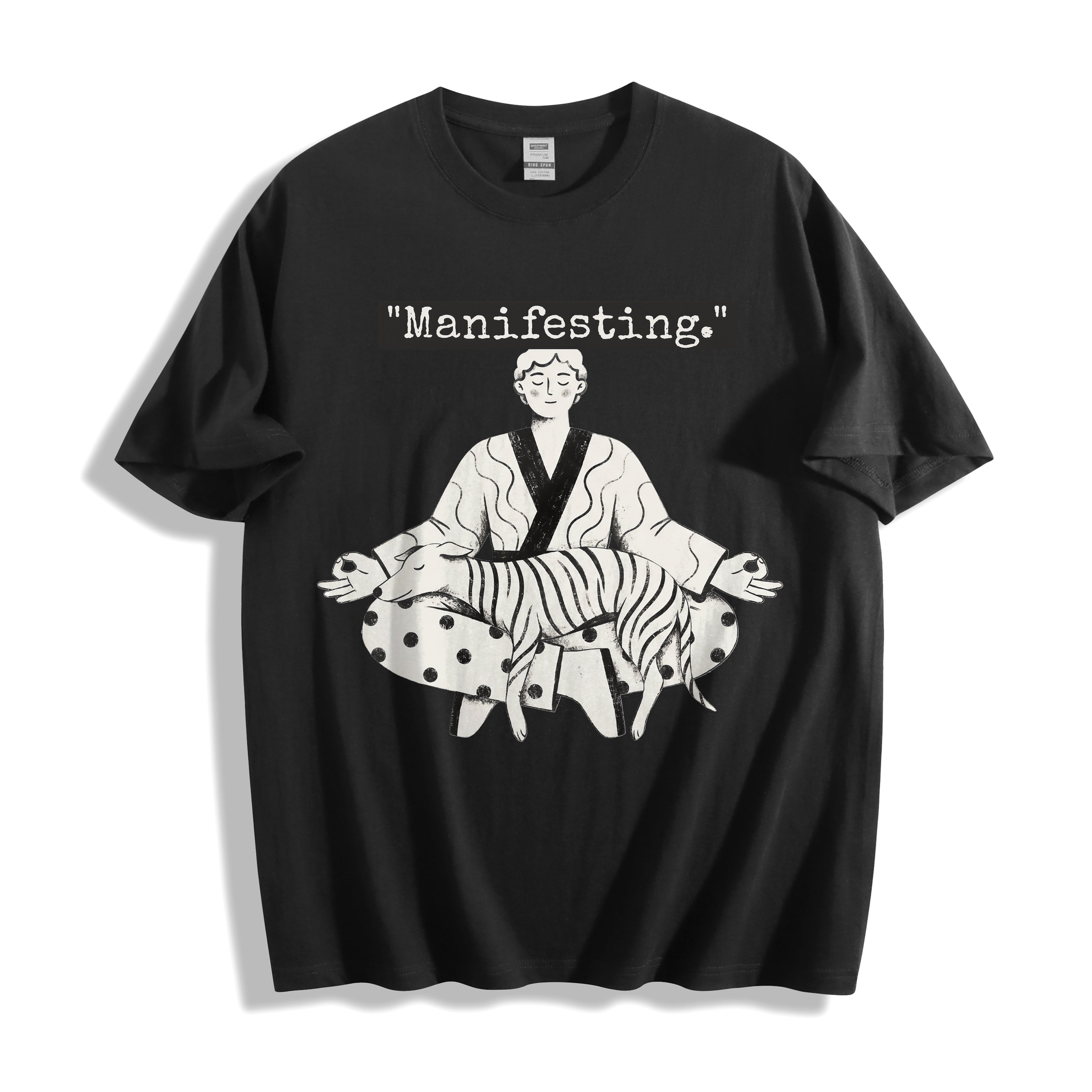 A flat lay of a black meditating boy and dog line art graphic tee, featuring the inverse high-contrast pure line art graphic for an edgy minimalist streetwear look.