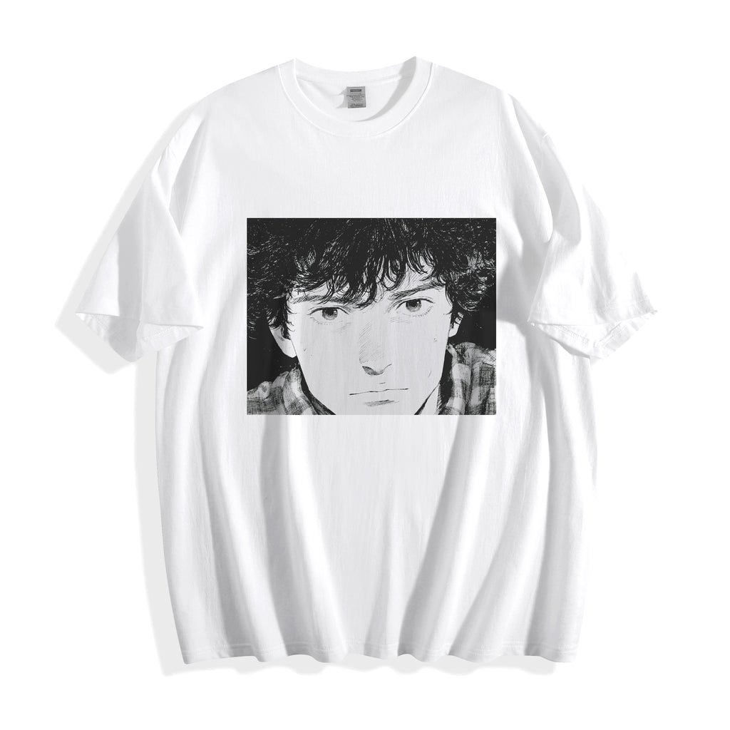 A flat lay of a white messy hair manga portrait graphic tee, displaying the high-contrast 90s retro anime illustration on a crisp background.