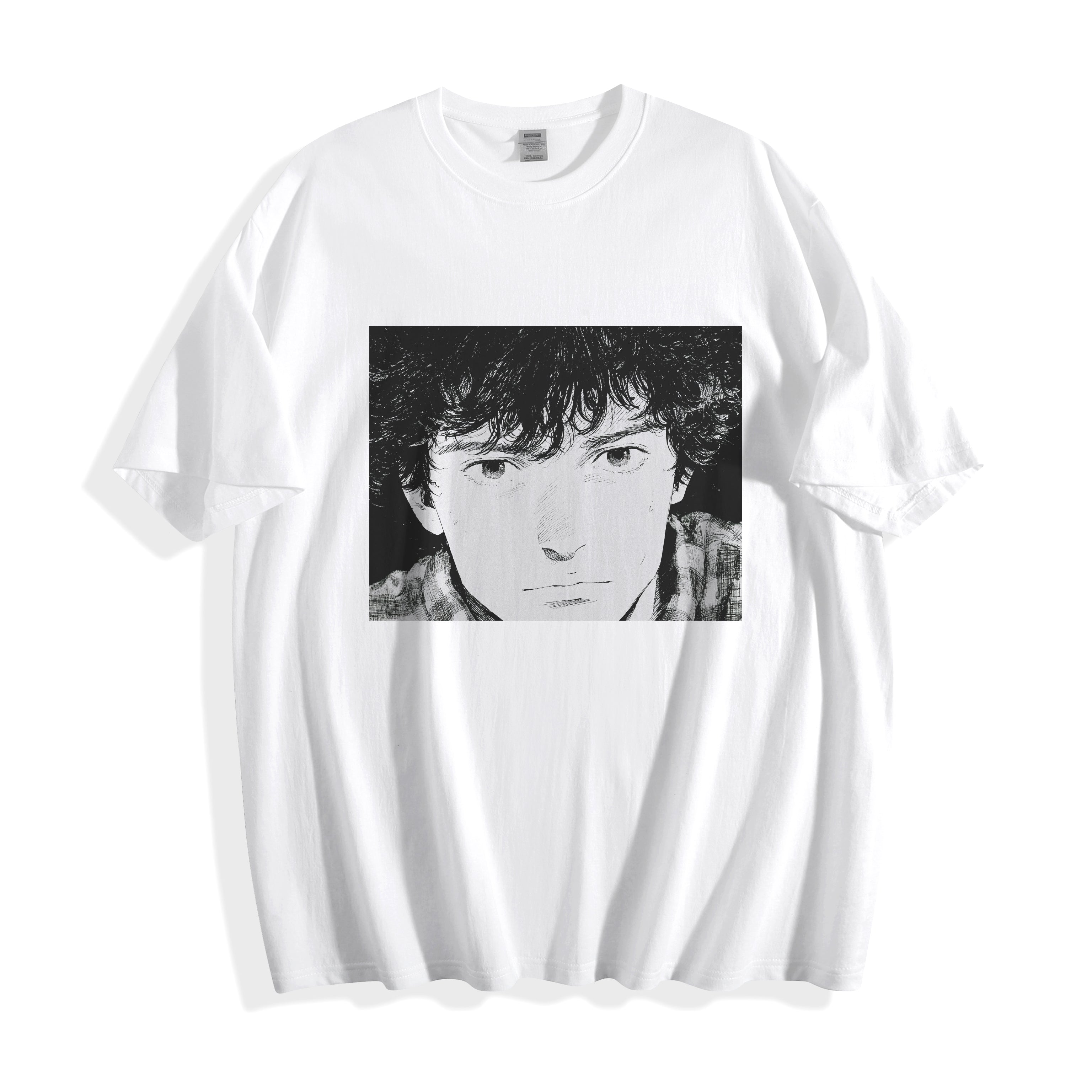A flat lay of a white messy hair manga portrait graphic tee, displaying the high-contrast 90s retro anime illustration on a crisp background.