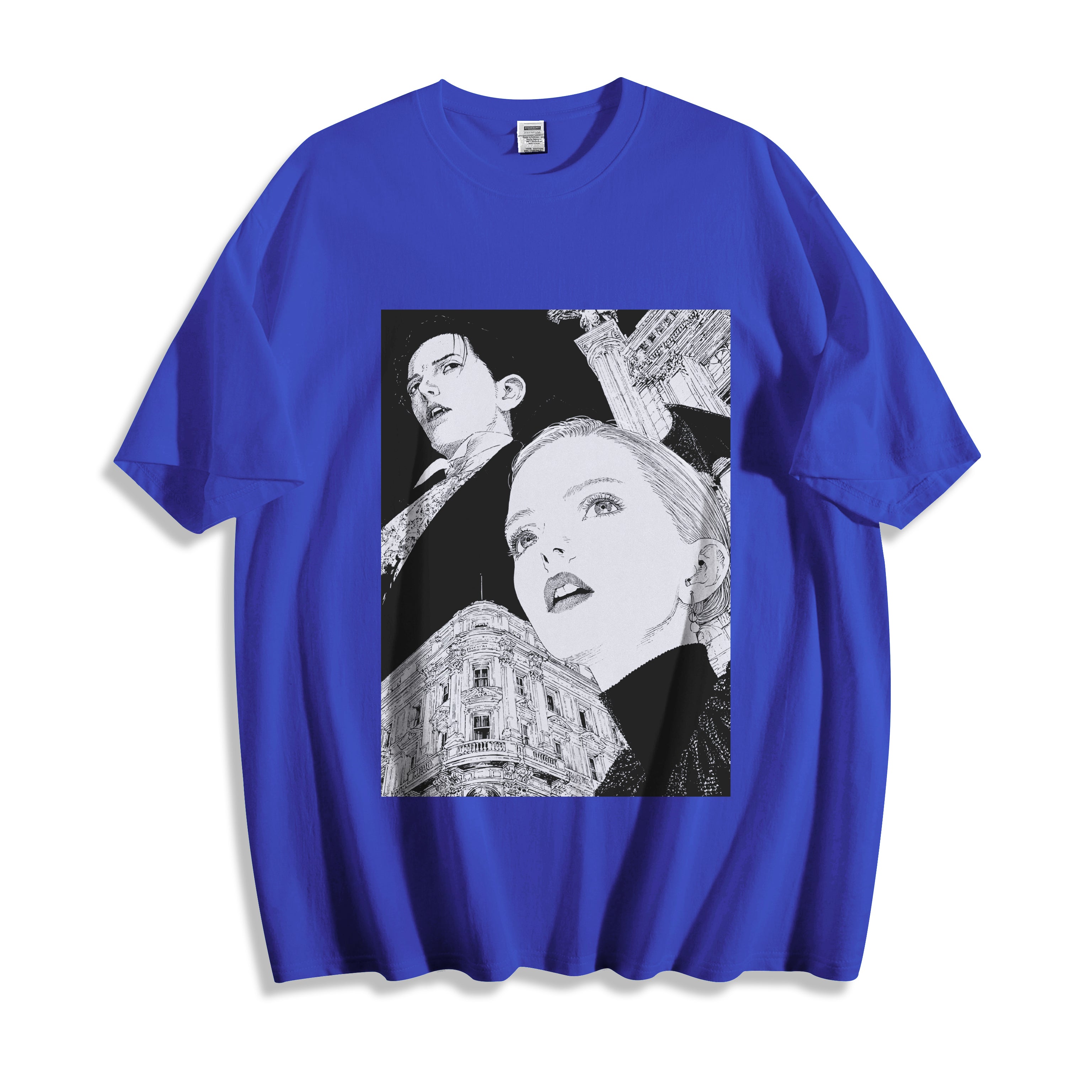 A flat lay of a blue monochrome upward gaze graphic tee, combining a bold primary hue with the timeless upward gaze portrait and architectural graphic.