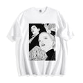 A flat lay of a white monochrome upward gaze graphic tee, featuring sharp line portraits of a boy and girl as a monument to the old world.