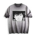 Flat lay product photography of an ombre grey heavyweight boxy fit t-shirt showcasing a 90s retro monochrome manga youth portrait on the front, displayed against a plain white background.