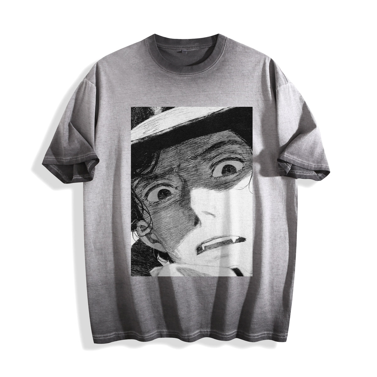 Clean flat lay product shot of an ombre grey heavyweight boxy fit t-shirt featuring a vintage alternative subculture comic panel graphic.