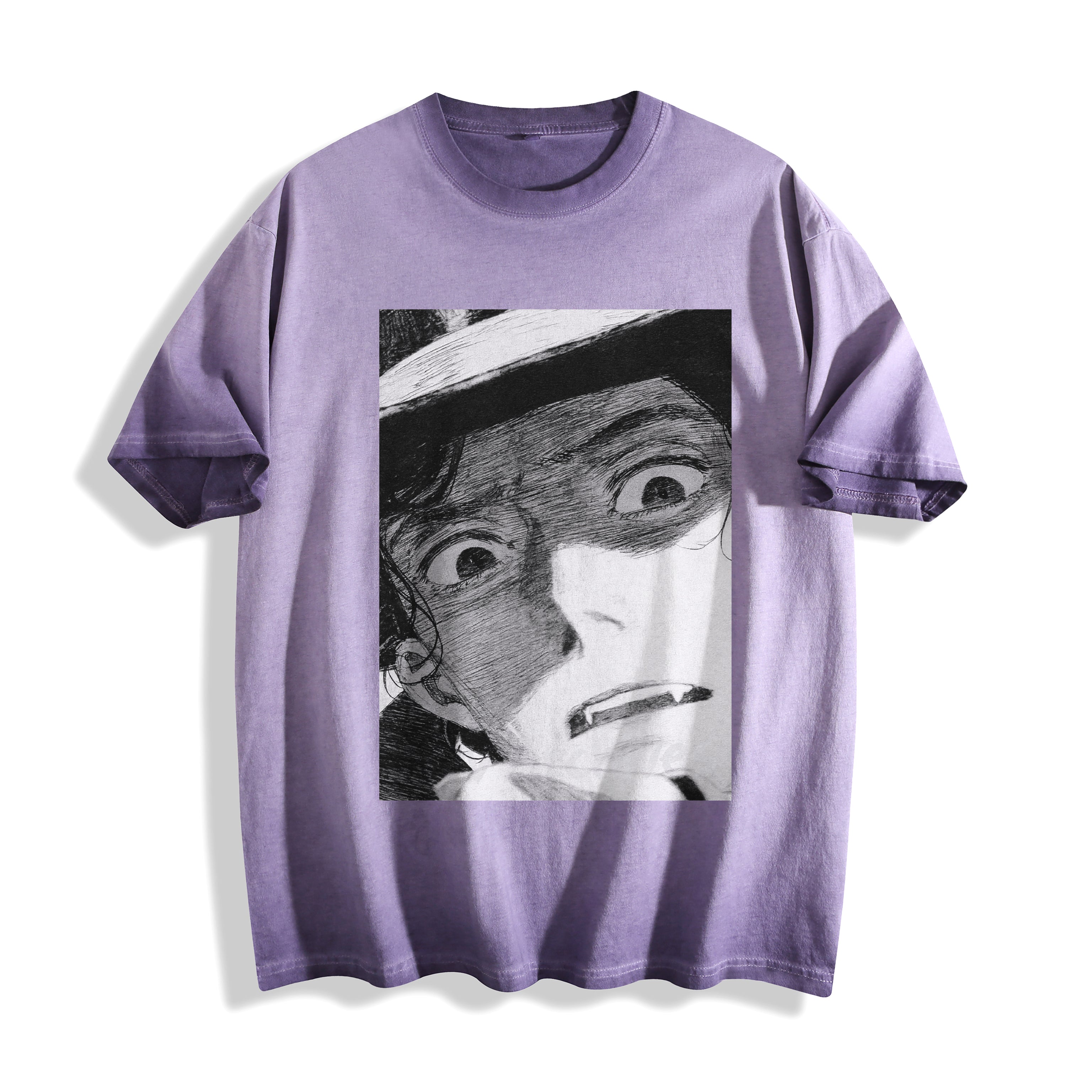 Flat lay product photography of an ombre violet heavyweight boxy fit t-shirt showcasing a retro black-and-white shocked manga panel illustration.