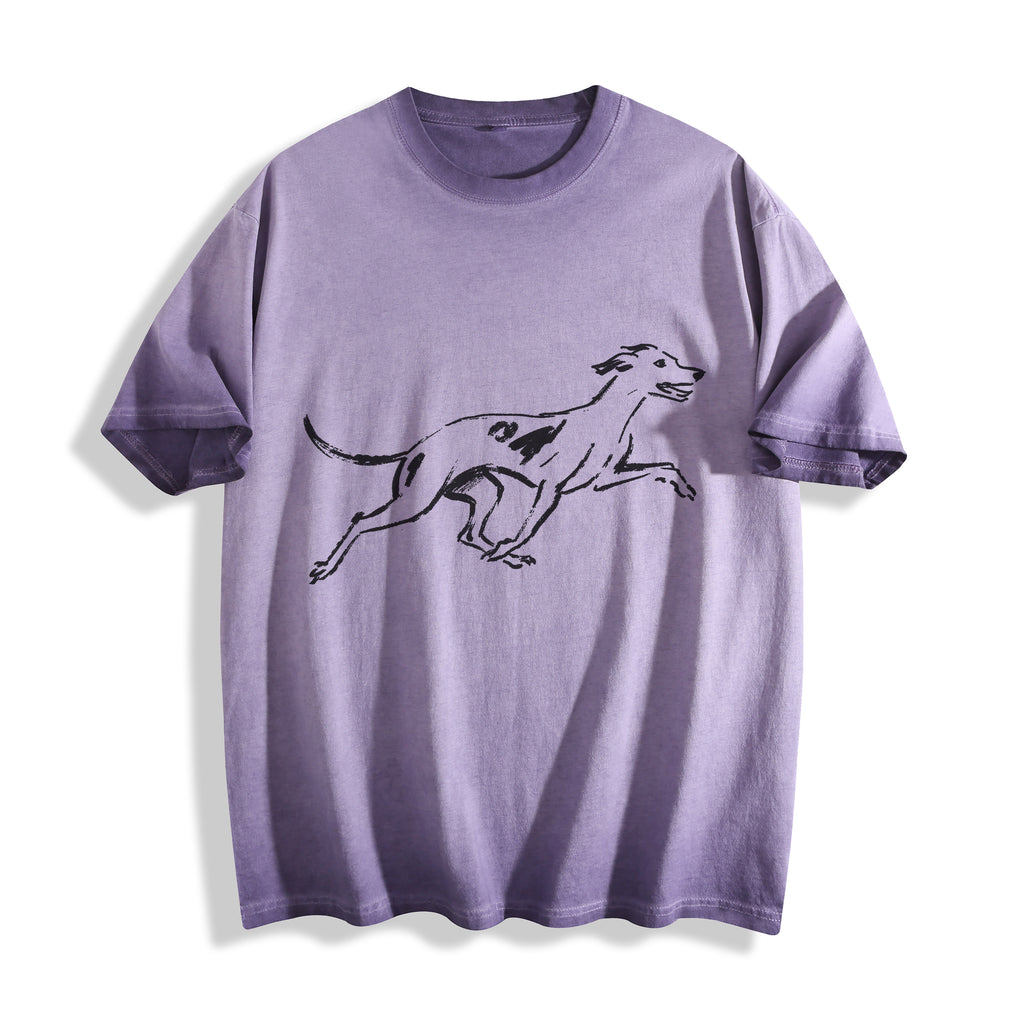 Flat lay product photography of an ombre violet t-shirt highlighting a clean and minimalist running hound line art graphic.