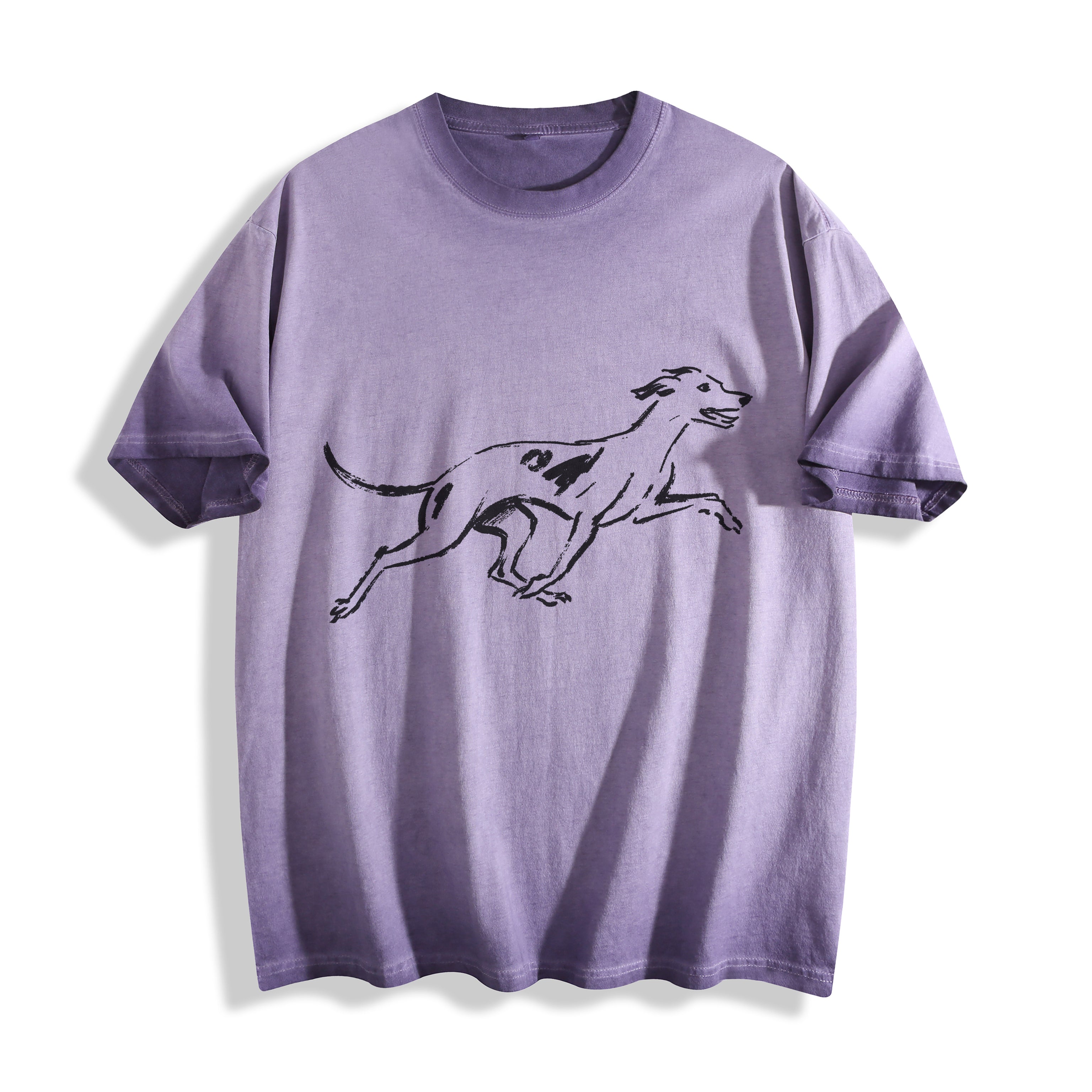 Flat lay product photography of an ombre violet t-shirt highlighting a clean and minimalist running hound line art graphic.