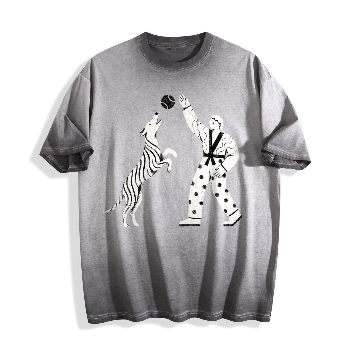 A flat lay of an ombre grey playing fetch ironic graphic tee, displaying the high-contrast ironic boy and dog illustration on a muted background.
