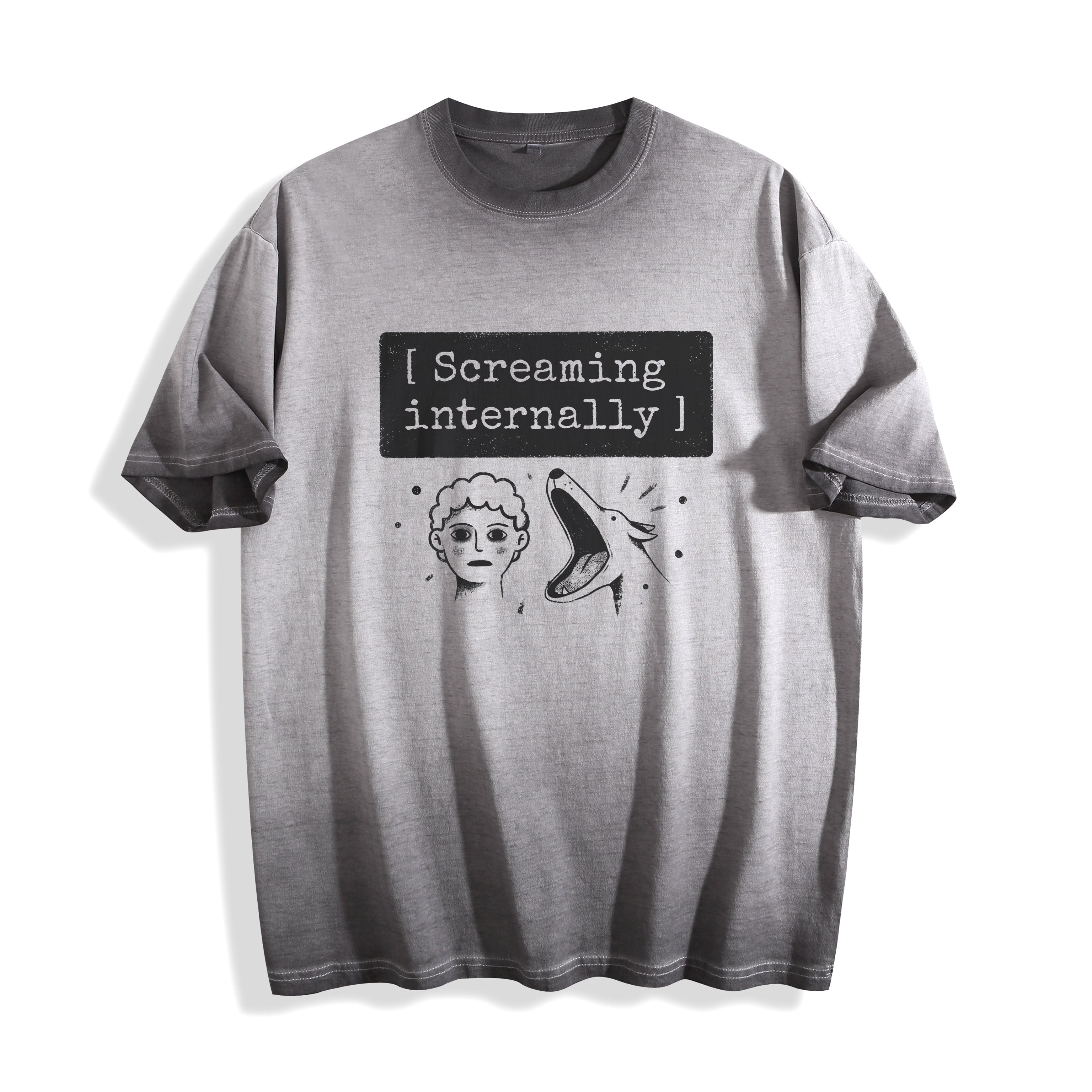 A flat lay of an ombre grey screaming internally ironic graphic tee, featuring the relatable text graphic for a sarcastic Gen Z streetwear look.
