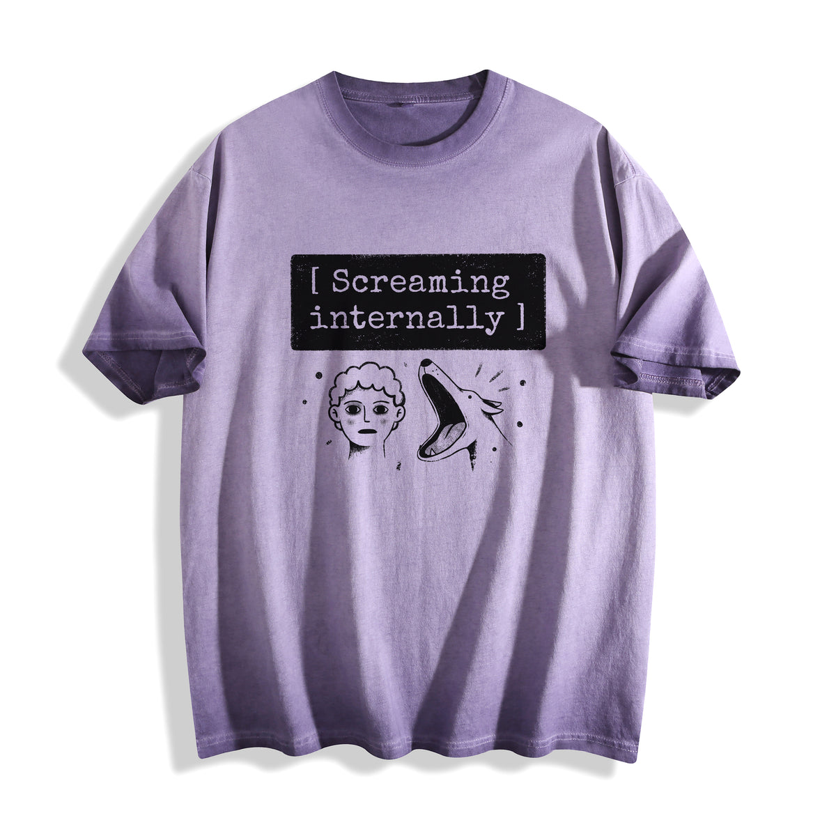 A flat lay of an ombre violet screaming internally ironic graphic tee, displaying the high-contrast sarcastic meme illustration on a muted purple base.