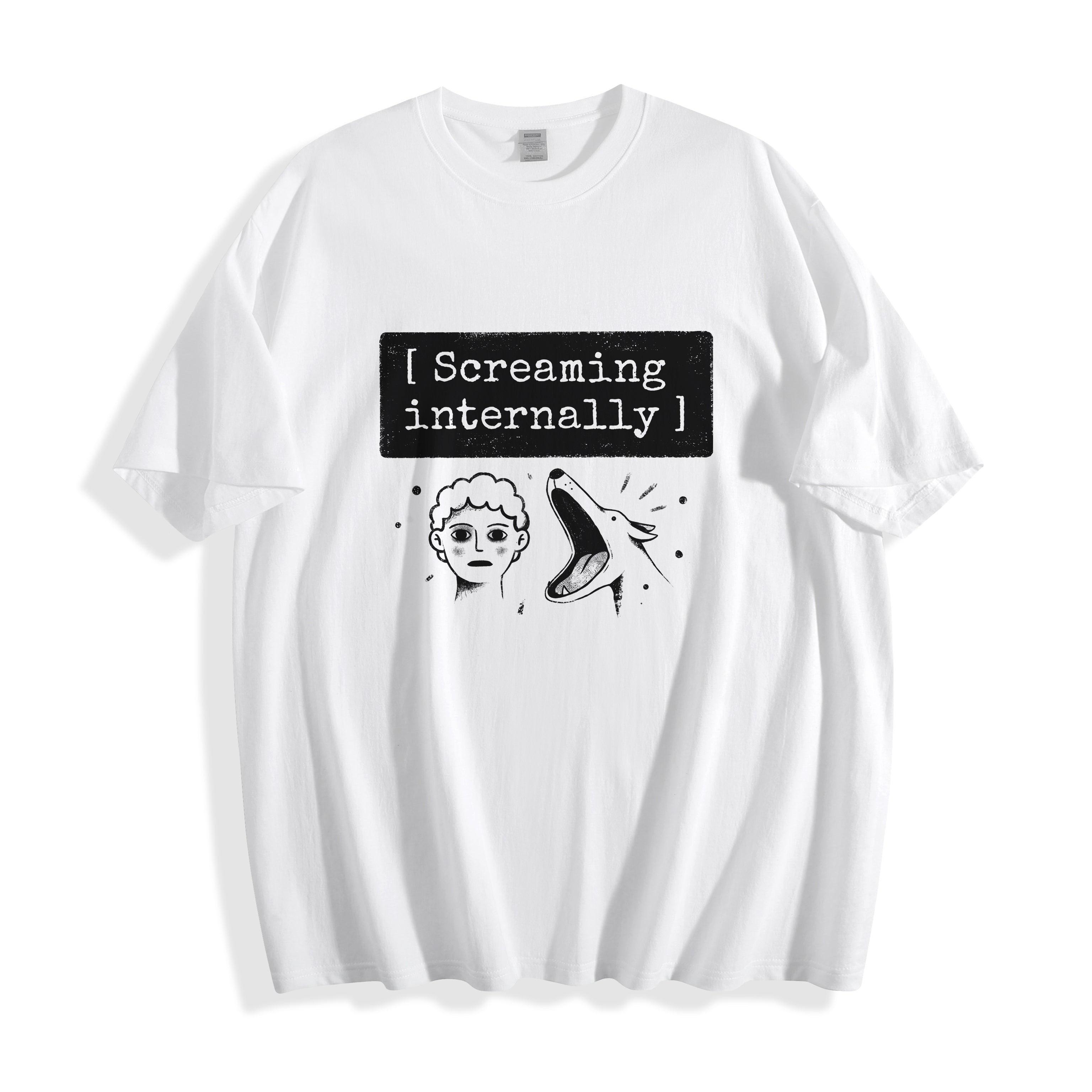 A flat lay of a white screaming internally psychological graphic tee, featuring a deadpan portrait and text box typography capturing a full-blown meltdown.