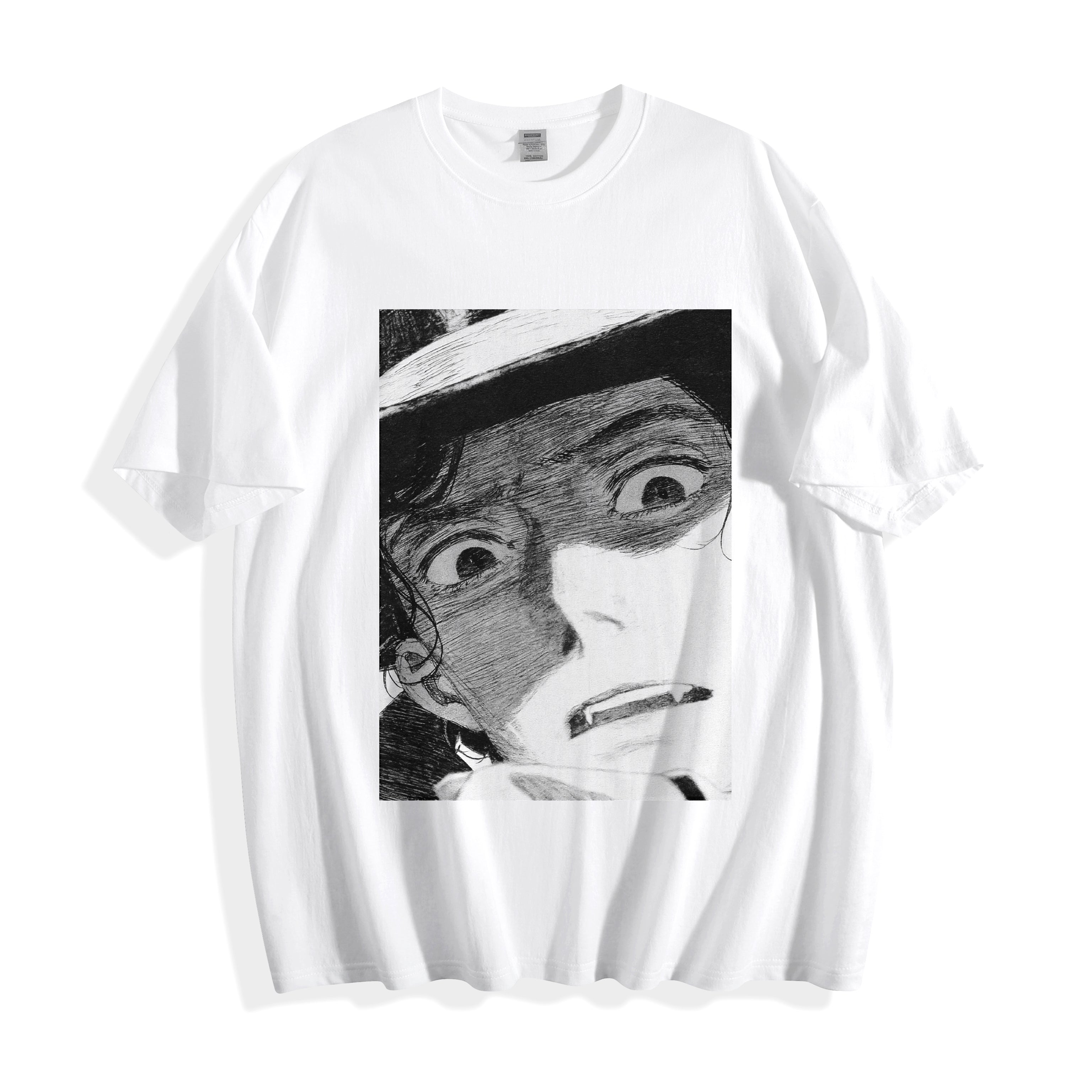 A flat lay of a white shocked face manga panel graphic tee, featuring the crisp monochrome print for a classic indie manga streetwear look.