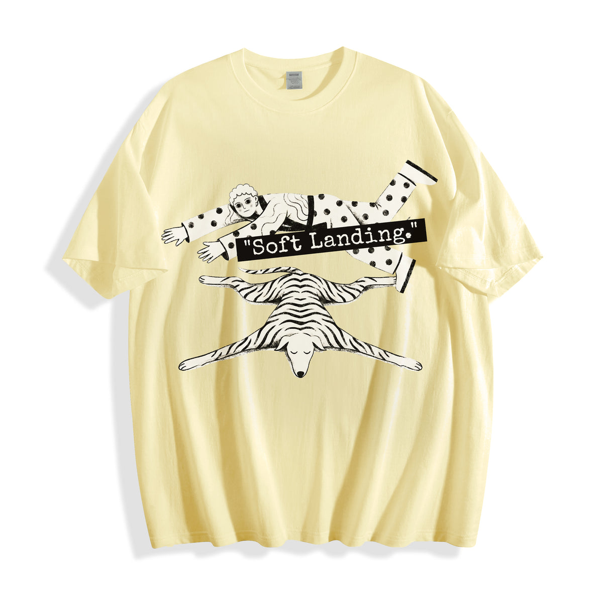 A flat lay of a butter yellow soft landing line art graphic tee, combining a warm neutral base with the satirical economic miracle graphic design.