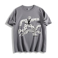 A flat lay of a gray striding away line art graphic tee, featuring a pure line art print of a person and dog striding with absolute conviction.