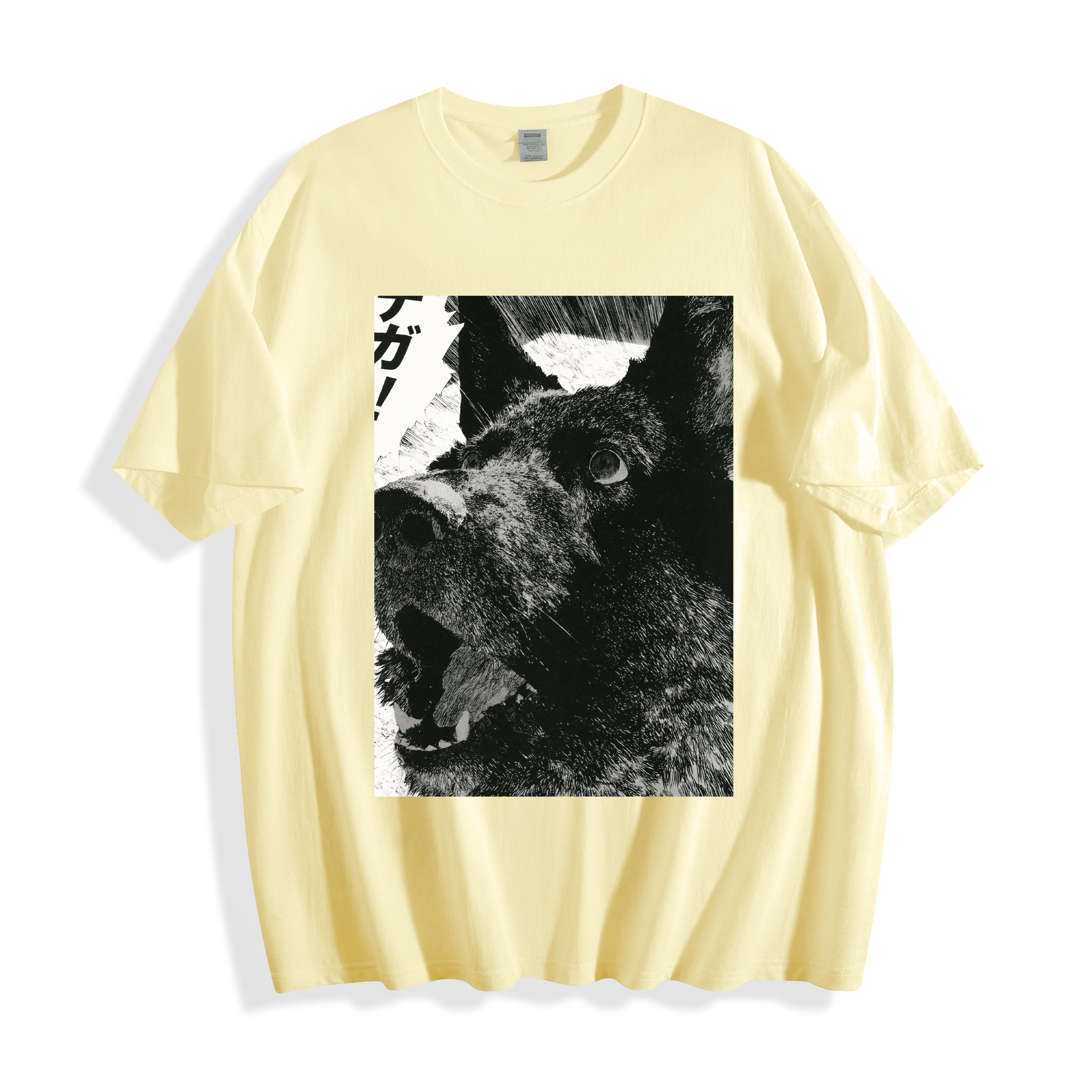 A flat lay of a butter yellow surprised dog comic panel graphic tee, combining a warm neutral tone with the striking texture of the sudden distraction print.