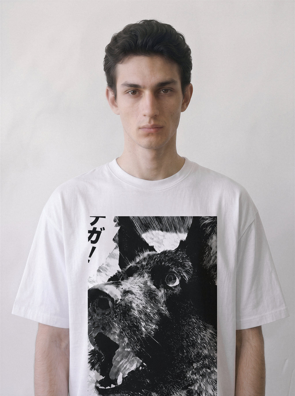 A close-up of a male model wearing a white surprised dog comic panel graphic tee, showcasing the surprised and cute expression of the dog in a split-second freeze.