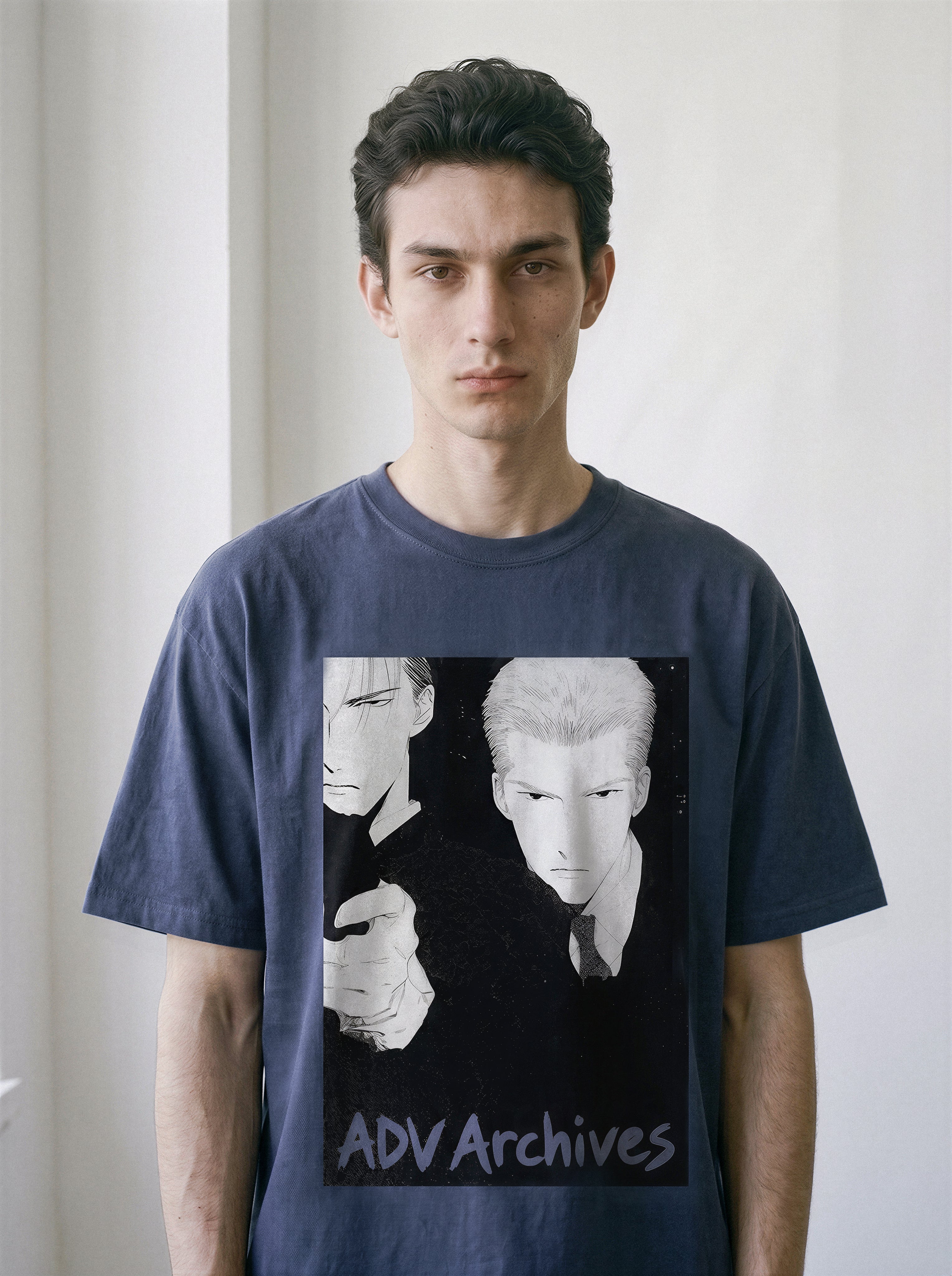 A male model standing naturally, showcasing the relaxed drape of a vintage navy oversized streetwear t-shirt with a 90s Yakuza execution graphic.