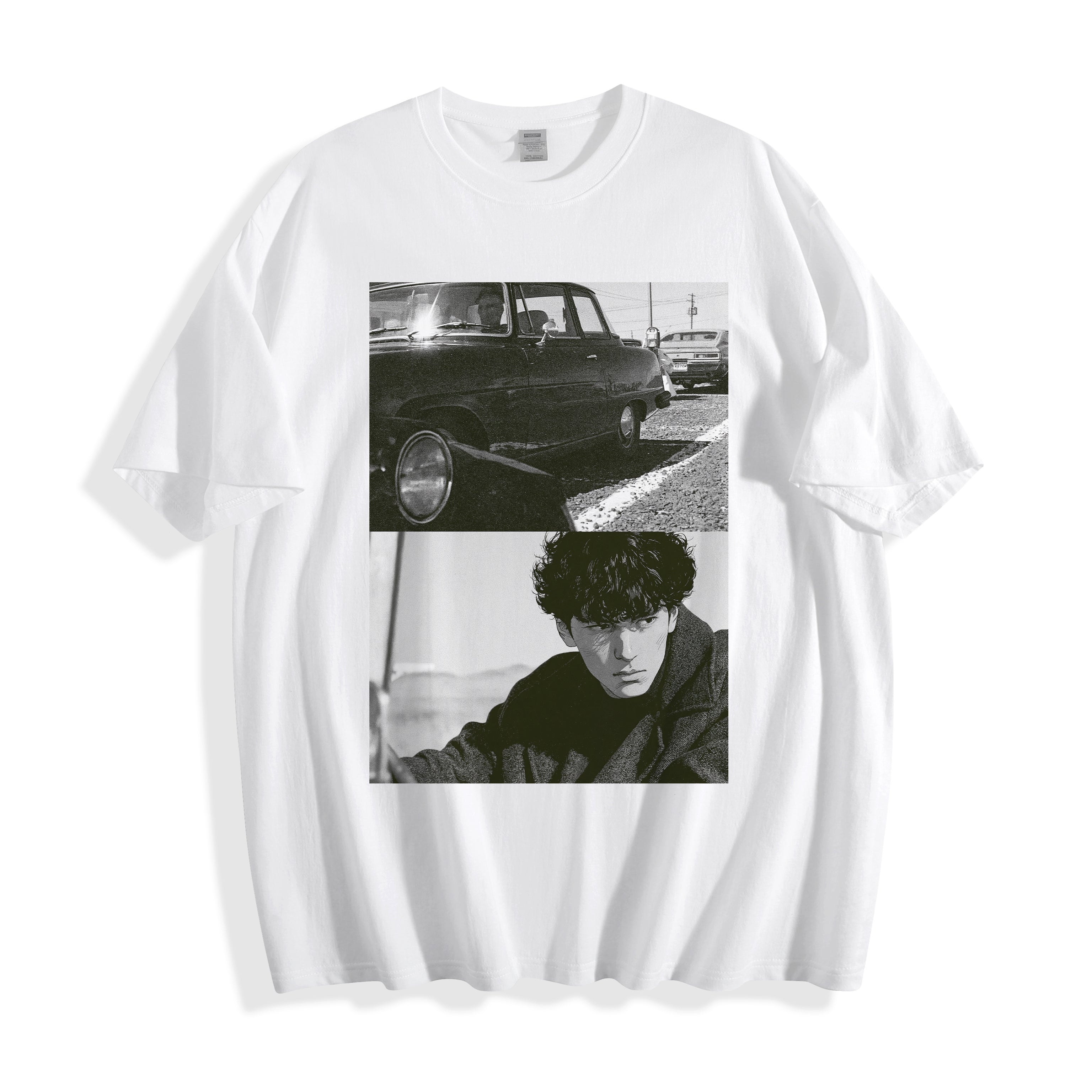 Clean flat lay shot of a white oversized streetwear t-shirt showcasing a black and white 90s cinematic dual-panel graphic.