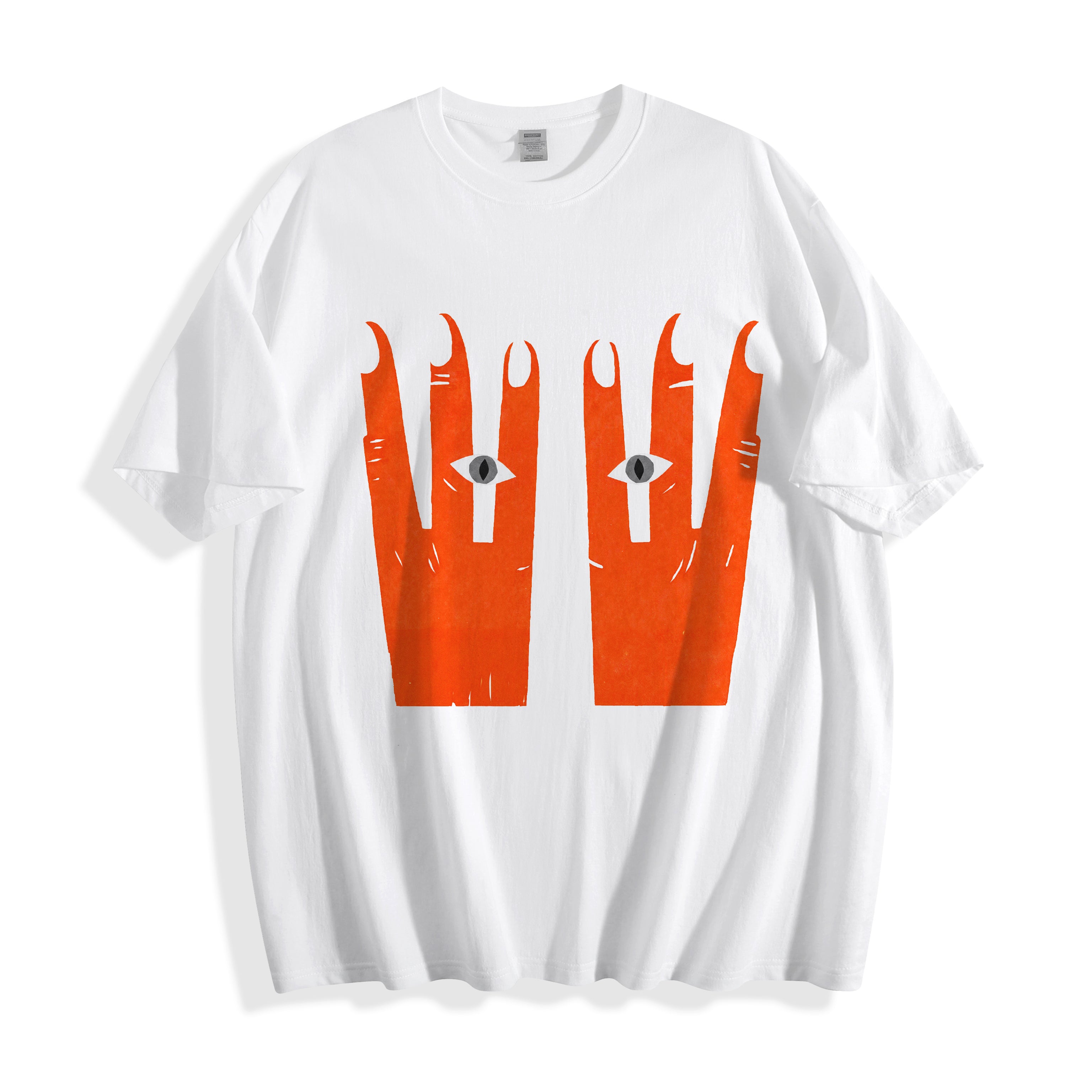 Clean flat lay product shot of a white oversized t-shirt featuring a highly detailed, contrasting orange surreal hands and eyes graphic.